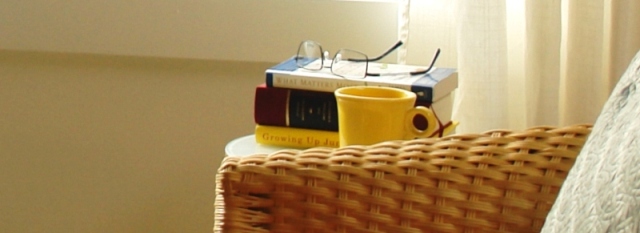 Closeup of the counselling office in Victoria, highlighting the psychotherapy books on the table.